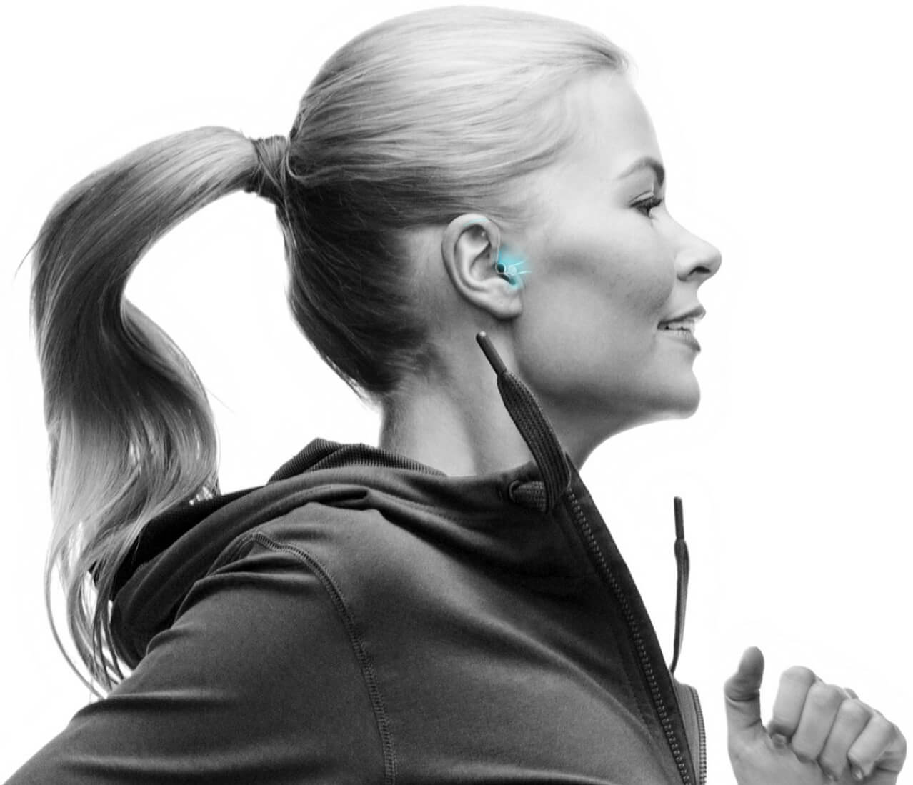 Woman running with Horizon hearing aids