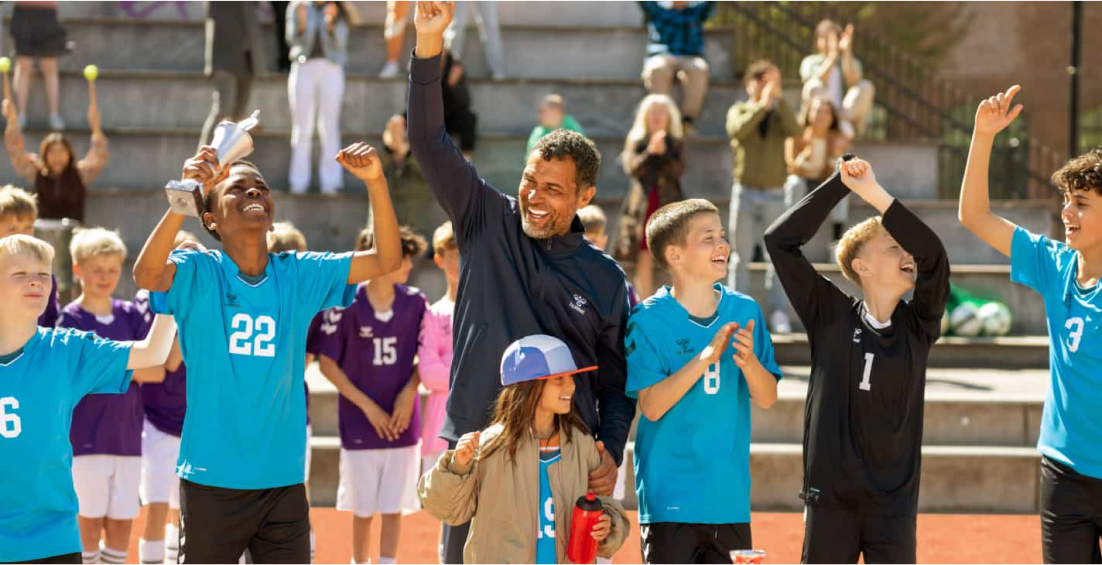Coach using Signia device winning a soccer match
